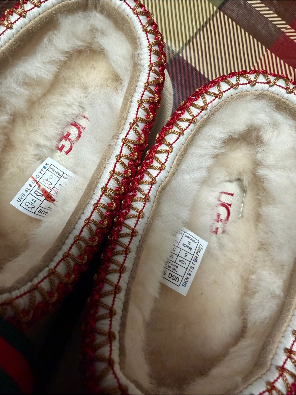 UGG Cream Sheepskin Moccasins with Red Trim